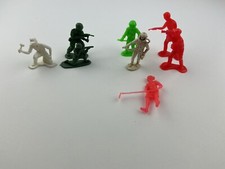 lot of miscellaneous plastic vintage toys soldier farmer astronaut toys