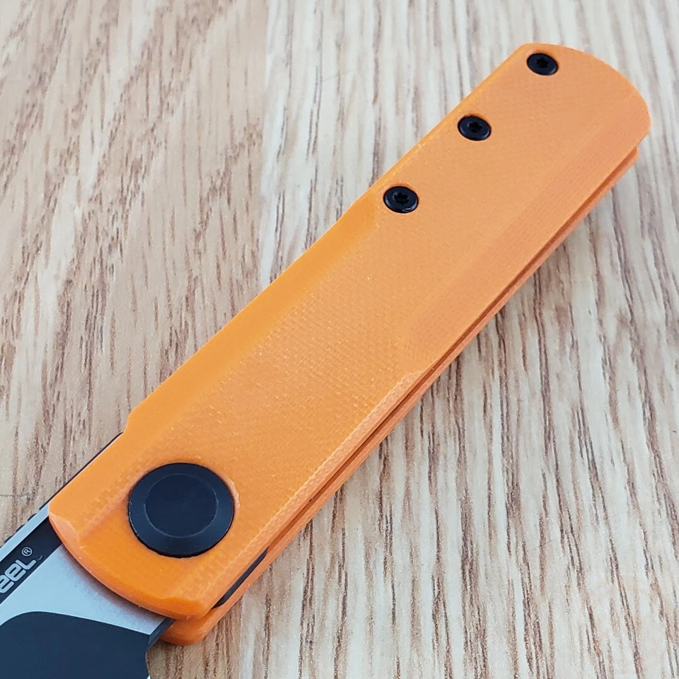 Cuchillo Plegable Real Steel G-Tanto 2.63" Nitro V Hoja de Acero Naranja Mango G10 Foto 4 de 4