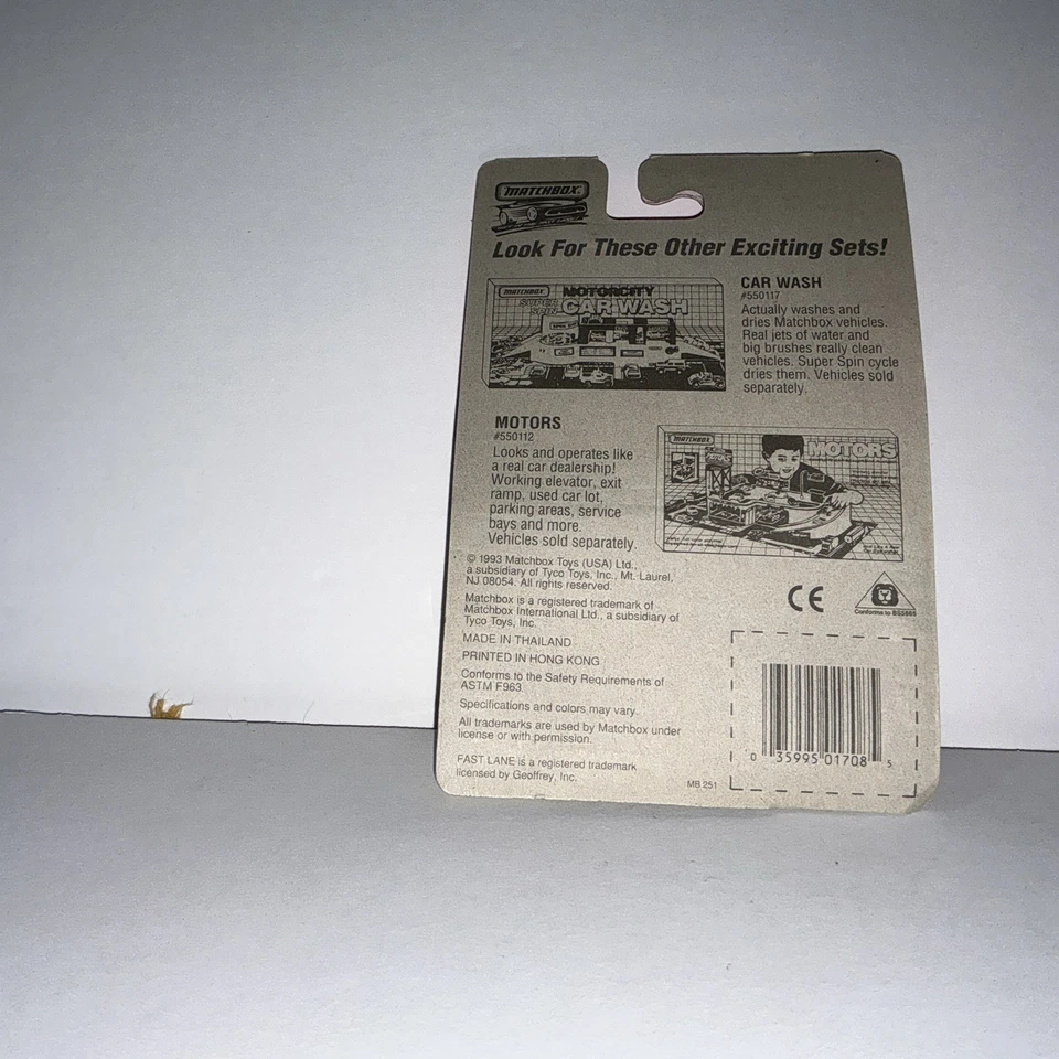 Matchbox 1993 MB 8 Mazda RX-7 color is yellow with orange & black graphics. - Image 2 of 4