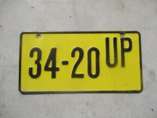 Suriname license plate #  34 - 20 UP