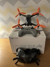 DJI FPV Drone Combo with Fly More Kit, Rugged Backpack, 6 Batteries, and Extras