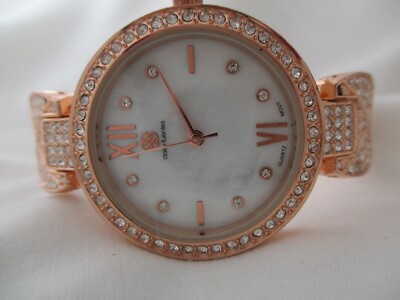 Daisy Fuentes Watch Rose Gold Tone Cuff Band Round Face Elegant