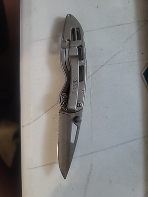 gerber foldind knife silver serrated edge w/clip 2 1/2 sharp blade