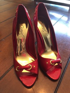 carlos santana red heels