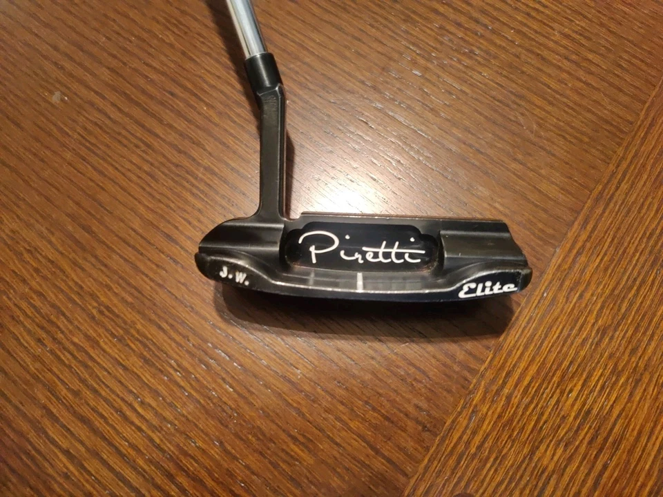 PIRETTI POTENA ELITE PUTTER 'PERSONALIZADO' NEGRO CON EMPUÑADURA PIRETTI NARANJA 34,25" Foto 2 de 4