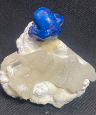 Cavansite crystal on calcite and white chalcedony in matrix [REPAIR]