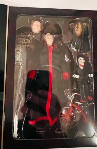 SET OF 2 SAW ULTIMATE JIGSAW KILLER 7" BLACK & RED ROBE VERSIONS NECA 2024-2025 - Picture 7 of 9