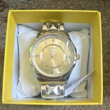 This is an Invicta Specialty69022watch featuring a gold dial with crystal acceen