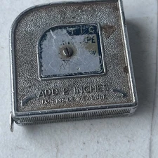 VINTAGE 6 Ft POCKETSIZE MEASURING TAPE - UNREADABLE BRAND - USA (tb2.2)