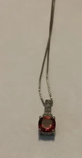 Sterling Silver Pendant With  A Red Stone And Cz’s 18” L (1092)