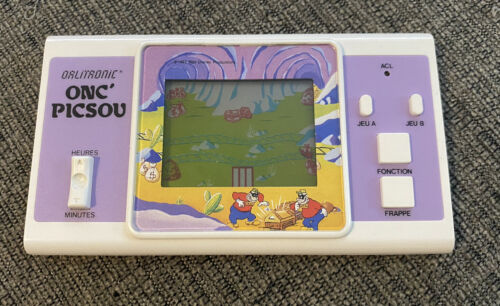 Orlitronic Onc' Picsou Handheld Lcd Game Tiger Virca Scrooge Mcduck game 1984 - Picture 1 of 2