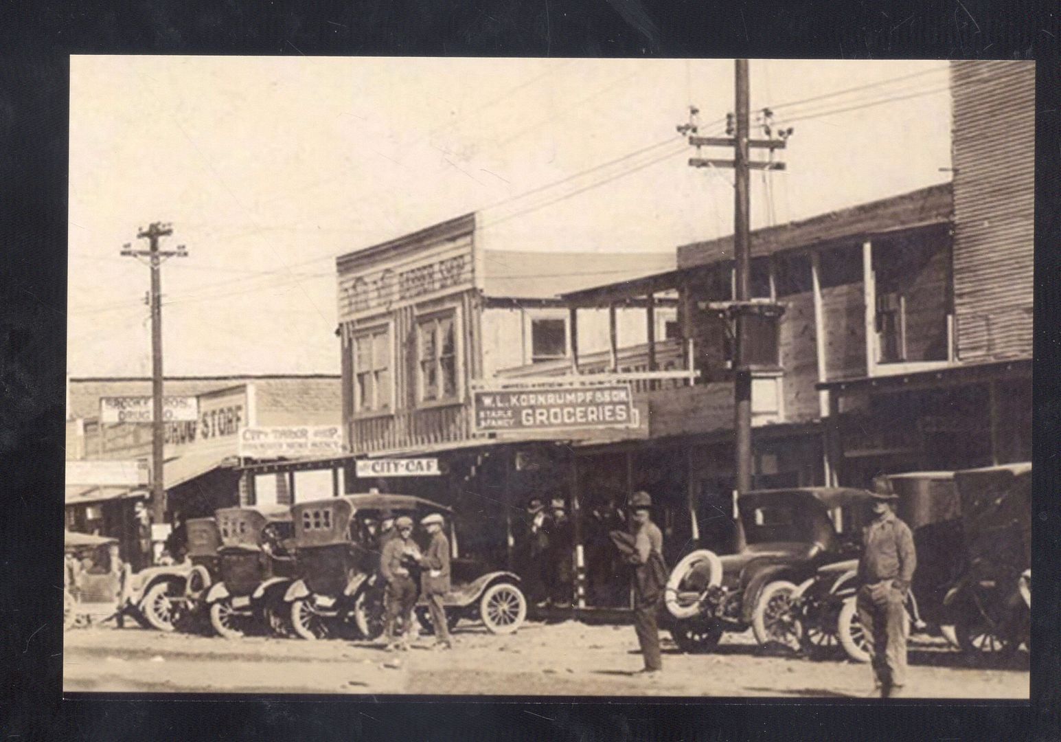 REAL PHOTO SMACKOVER ARKANSAS DOWNTOWN STREET SCENE OLD CARS POSTCARD