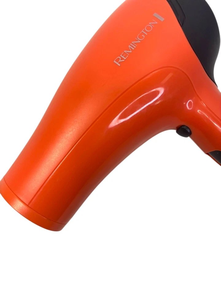 Secador de pelo mediano Remington D-3015 con tecnología cerámica iónica melocotón/naranja Foto 2 de 3