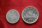 1962 Canada Silver $1 Dollar ,plus 50 cent coins (near mint) condition