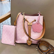 COACH Rowan Bucket Bag In Signature Canvas With Charms Powder Pink CEA23 F/S JP