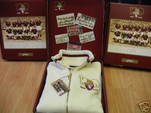 maglione asics