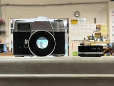 Kodak Retina Reflex III W/ Rodenstock Rotelar 135mm f/4 lens. Camera needs work