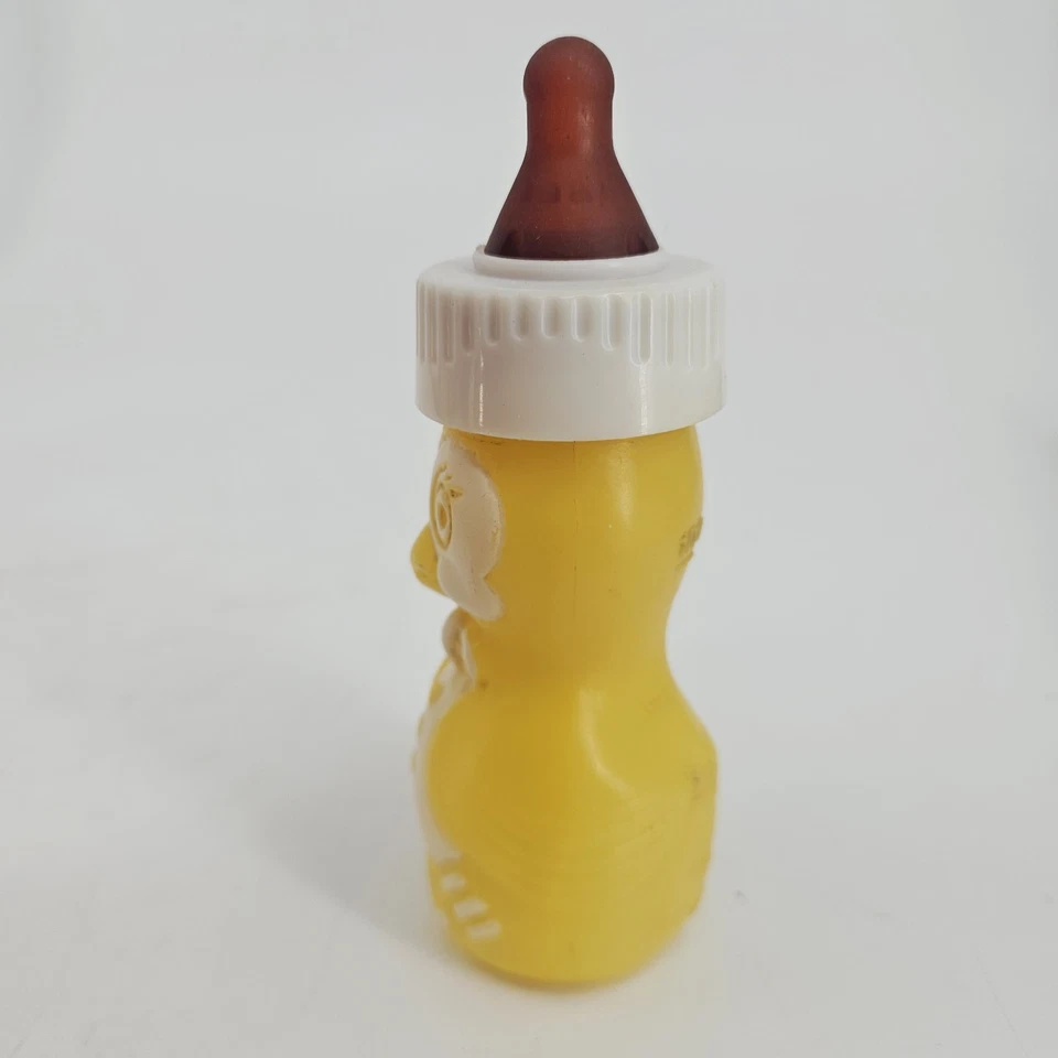 Biberón de plástico Gerber Yellow Penguin de colección de los años 70 4 oz coleccionable Foto 2 de 4