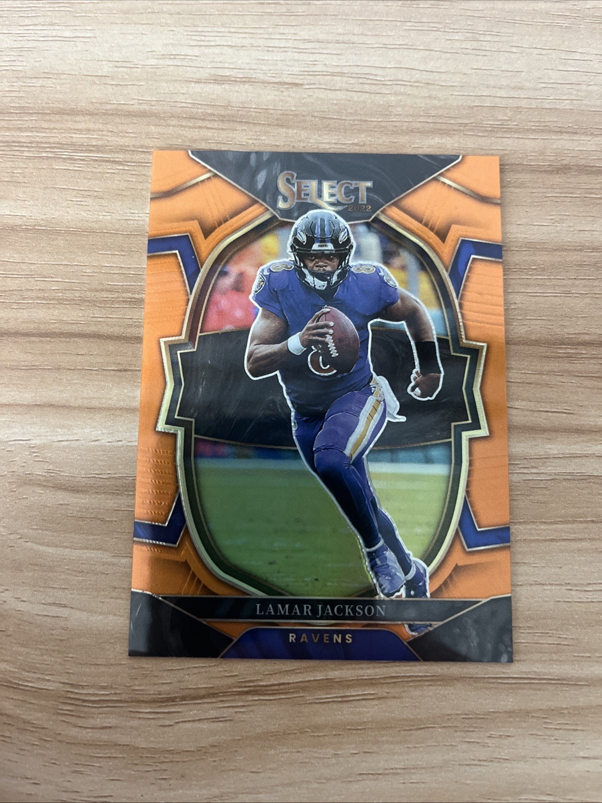 2022 Panini Select - Concourse Lamar Jackson #73 Orange Prizm /49