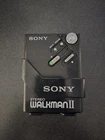 Sony Walkman WM-2 Cassette Player BLACK With New Belts & Working & Carrying Clip