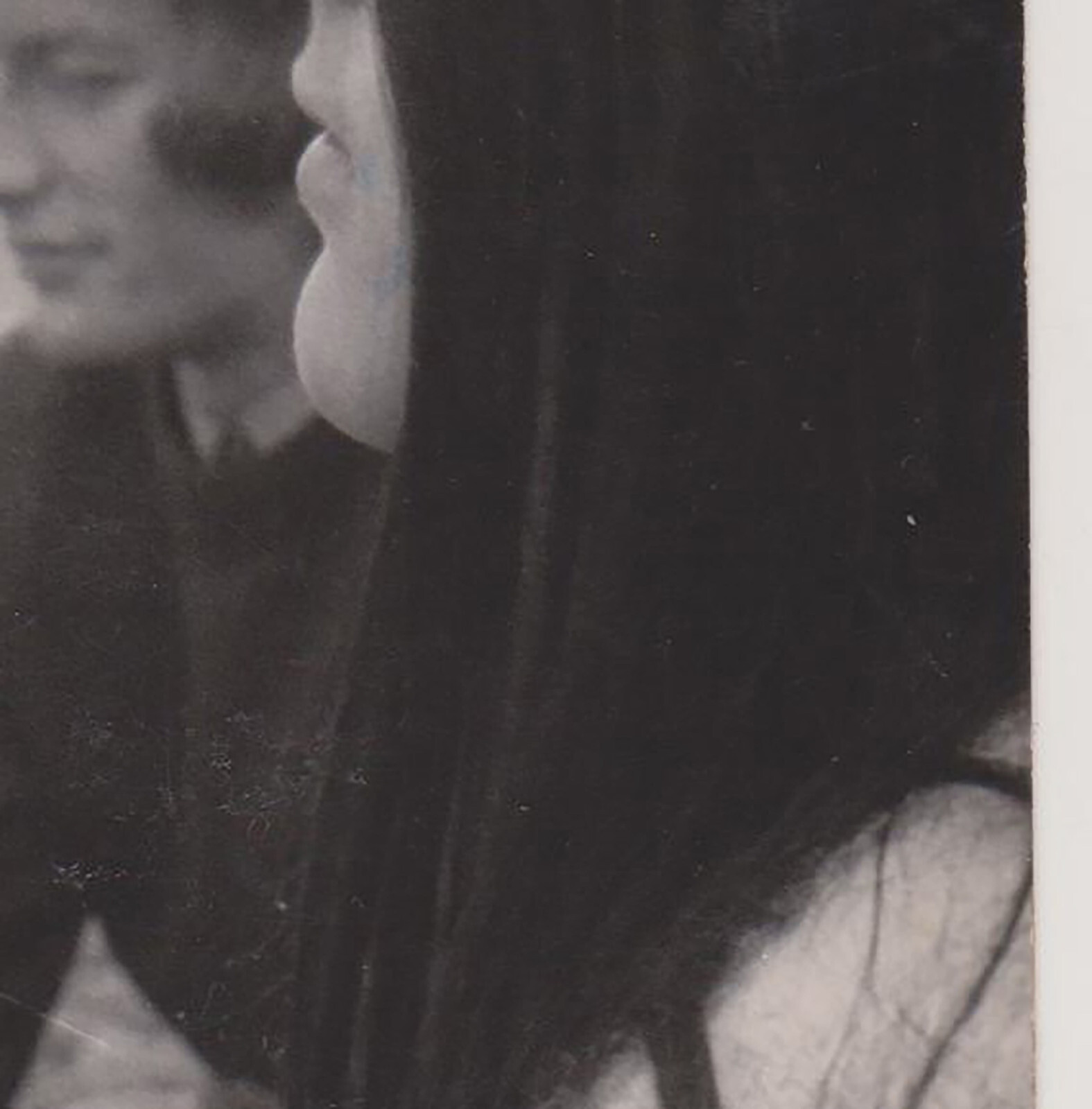 Lost in Thought Young Girl and Man Share a Quiet, Reflective Moment by the Water