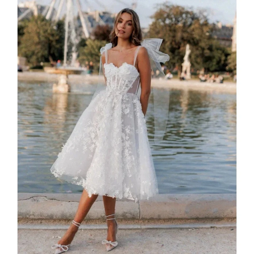 Vestidos de novia románticos con apliques florales 3D boho hasta el té línea A Foto 2 de 4