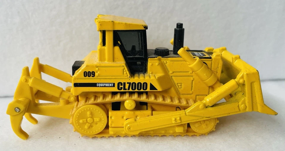 Bulldozer Matchbox Real Working Rigs CL7000 en amarillo (2008, RW009, 9 cm) - En muy buena condición Foto 4 de 4