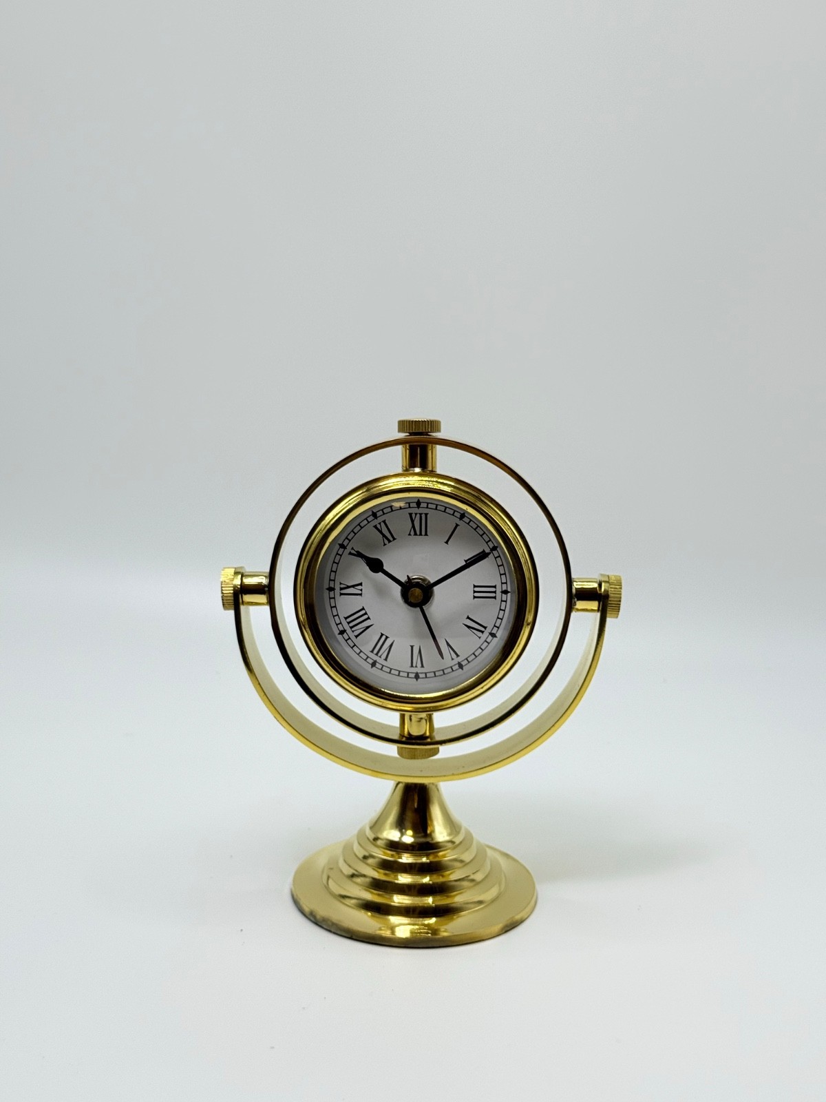 Alpenor - Vintage Brass Rotating Desk Clock - Elegant Roman 