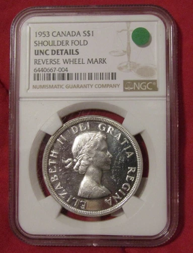 1953 CANADA SILVER DOLLAR-SHOULDER FOLD..NGC UNC. DETAILS-REVERSE WHEEL MARK