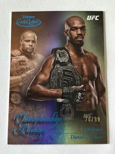 2024 Topps Gold Label UFC Jon Jones Daniel Cormier Championship Lineage Blue /99