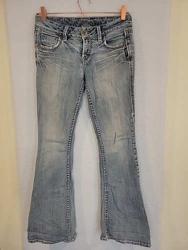 Jeans vintage Y2K argento Eden lavaggio chiaro denim etichetta taglia 27x31 vita bassa svasati