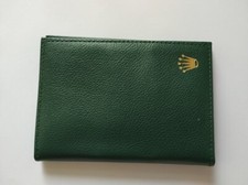 Rolex Rolex  Sea dweller green leather wallet and contents