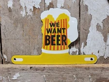VINTAGE WE WANT BEER PORCELAIN SIGN OLD TAG TOPPER RESTAURANT BAR ALE ALCOHOL