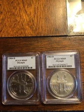 (2) 1984 D $1 Olympic Silver Dollars Los Angeles PCGS MS69