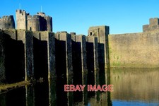 PHOTO  CAERPHILLY CASTLE . THE EAST WALL. CAERPHILLY CASTLE IS THE BIGGEST CASTL
