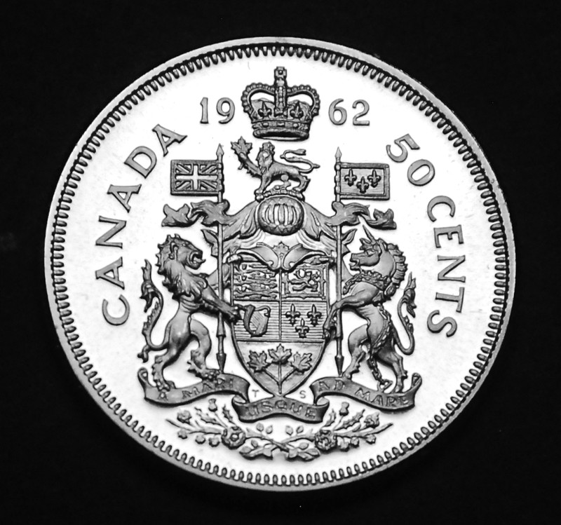 1962 50¢ silver coin that is UNC and MS in original mint cellophane - flawless