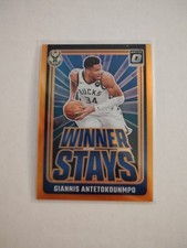2024-25 Panini Donruss Optic Giannis Antetokounmpo #4 Winner Stays Orange 12/39