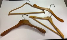 4 Vintage Wooden Clothes Hangers Including The Penn Harris and Blairs Dry Clean