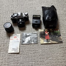 Canon AE-1 Program 35mm SLR Film Camera with 2 Lenses, Speed light,  Manuals