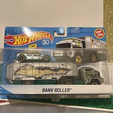 Hot Wheels  1:64 Transporter Vehicle With Car BANK ROLLER