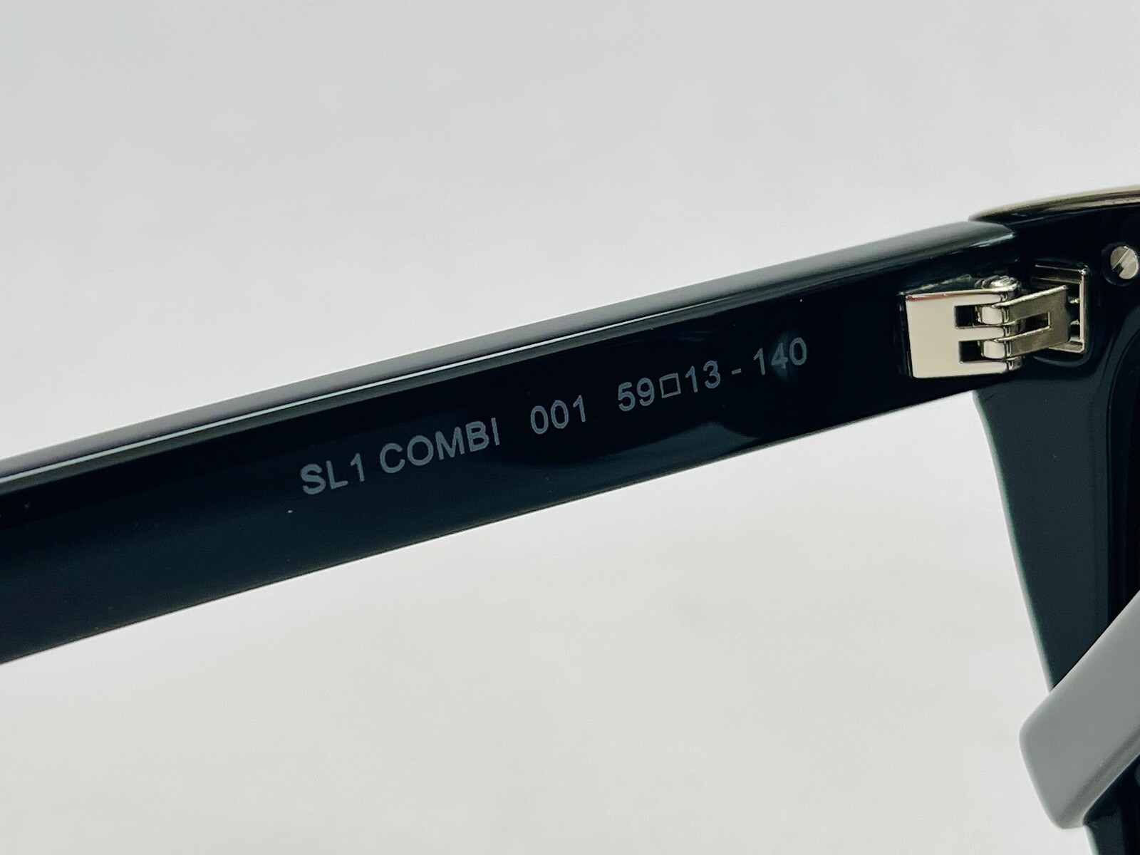 SAINT LAURENT YSL SL1 COMBI Top in metallo 001 Occhiali da sole unisex rettangolari neri