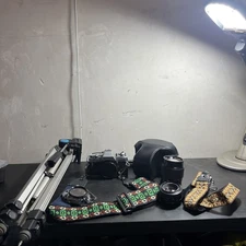 Minolta X-370 35mm film camera w Minolta f1.7 50&135mm lens lots of extras works