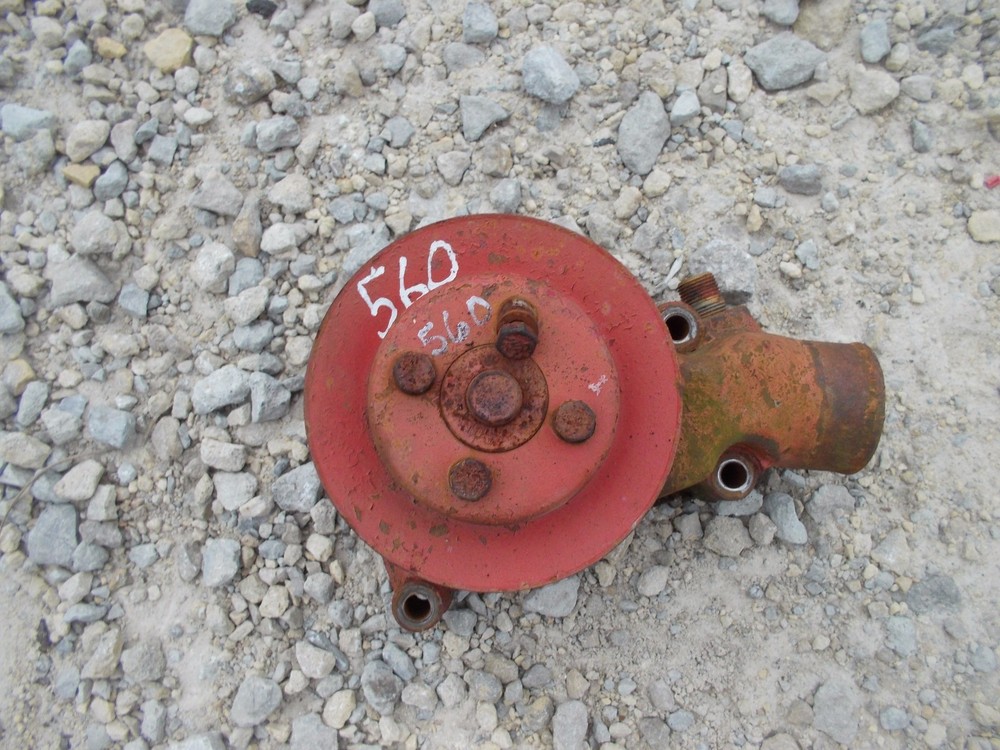 Farmall IH 560 tractor engine motor water pump assembly -- belt pulley for fan