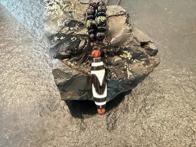 Double Wave Tibetan (མདོ་ཕྱག་) Dzi Bead   Symbol of Flow, Balance, and Prosperi