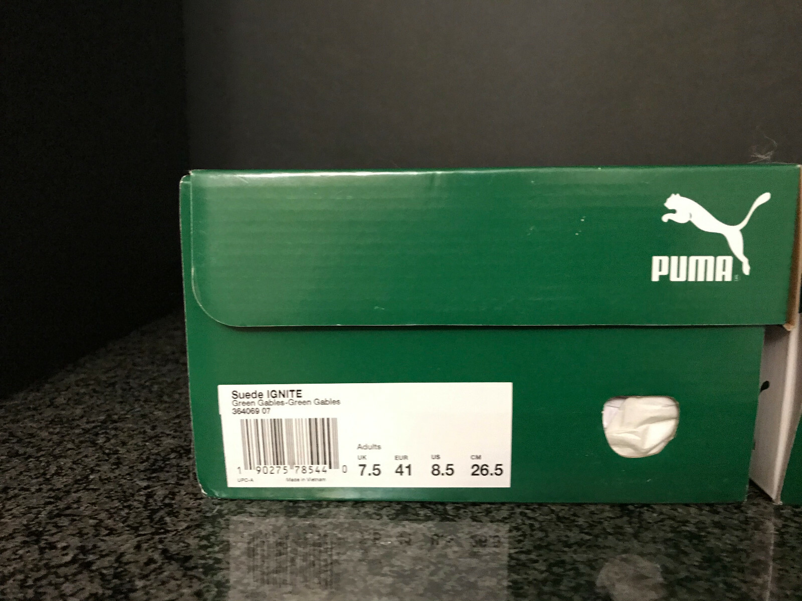 puma green shoe box