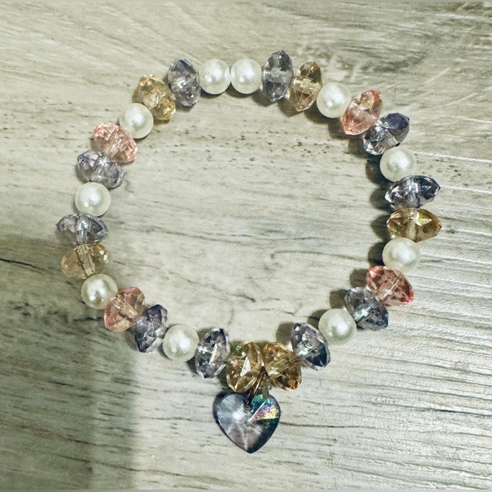 A multi-color translucent crystal bead bracelet w… - image 3