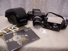 Nikon F with Photomic FTn Finder, Nikon Nikkor-Q Auto lens, booklets, case