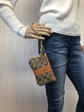 Porte monnaie petite pochette Coach Toile et cuir Monogramme S136