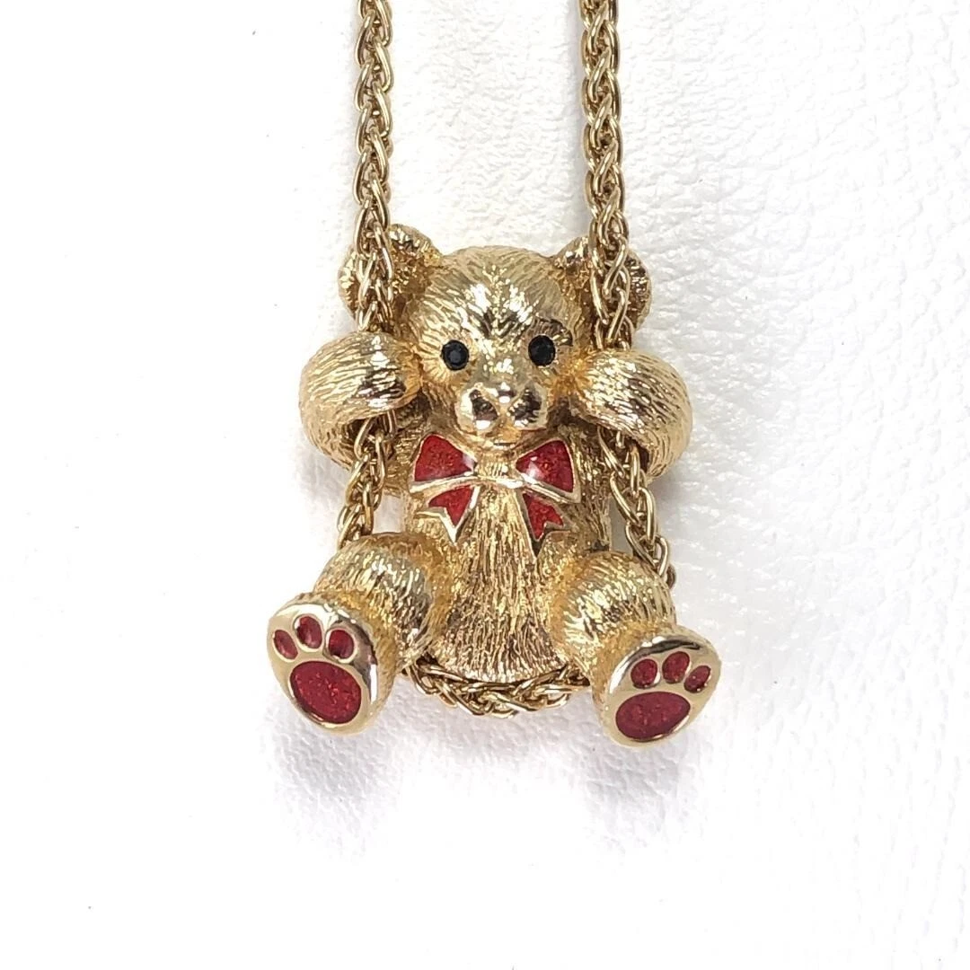 Collana Burberry con ciondolo orso altalena placcato oro vintage M6