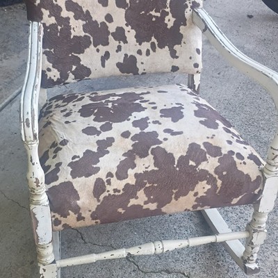 Vintage Distressed Cow Print Upholstered Wood Rocking Chair with Armrests
